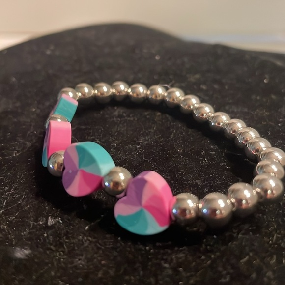 7” beaded stackable stretch bracelet with 23 silver beads & 4 heart shaped beads - Picture 4 of 13